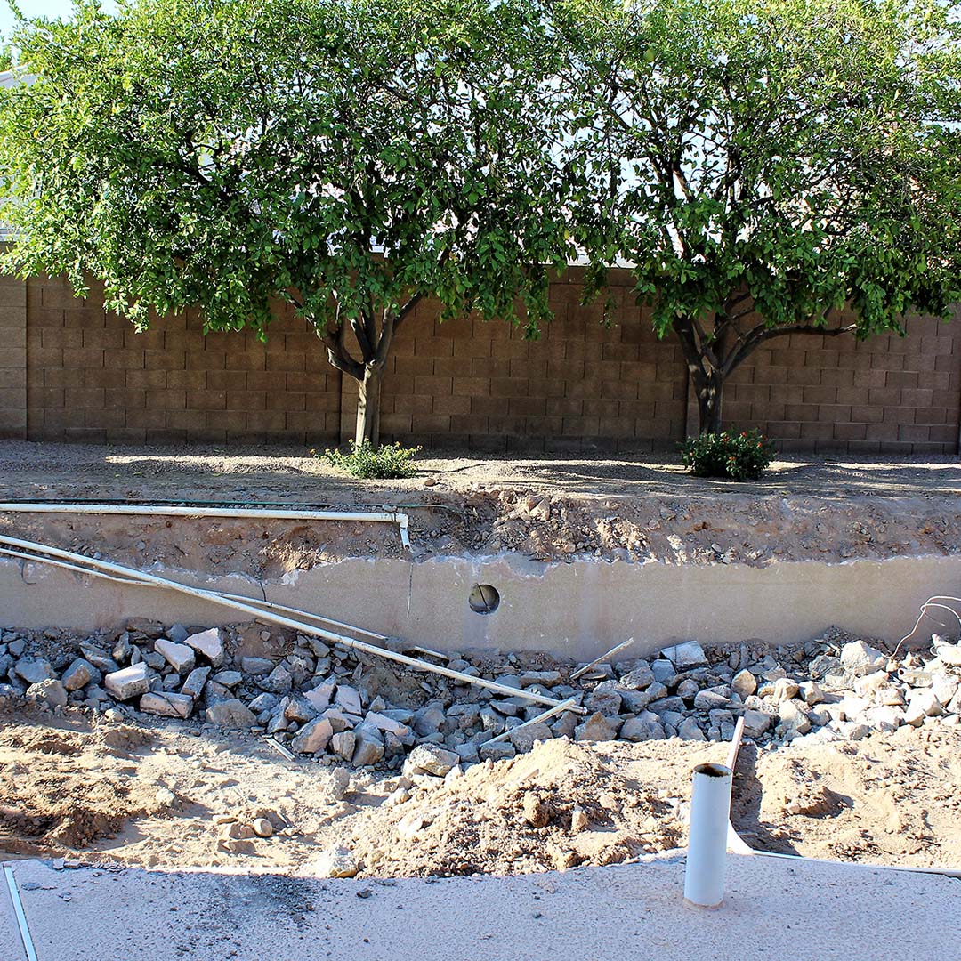 Empty residential swimming pool under demolition.