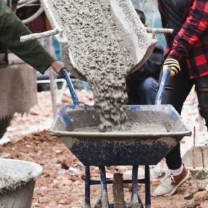 putting concrete in wheel barrow